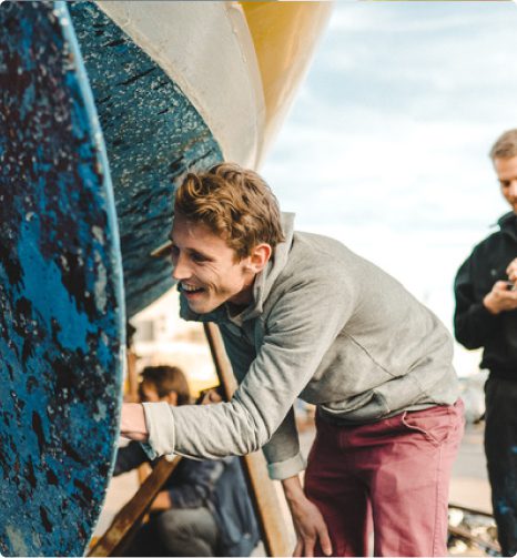 Man fixing a boat